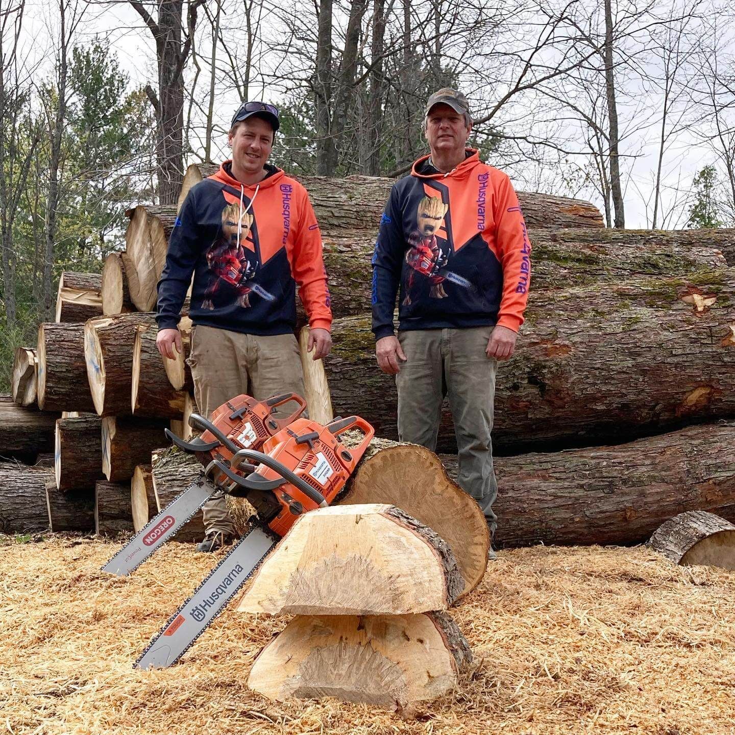 Gary and Curtis Matthews hand picking wood