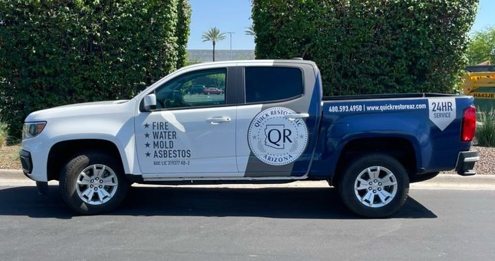 Quick restore truck parked outside of a customers home