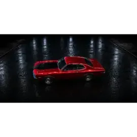 Red vintage sports car on a glossy dark floor with reflections and spotlights