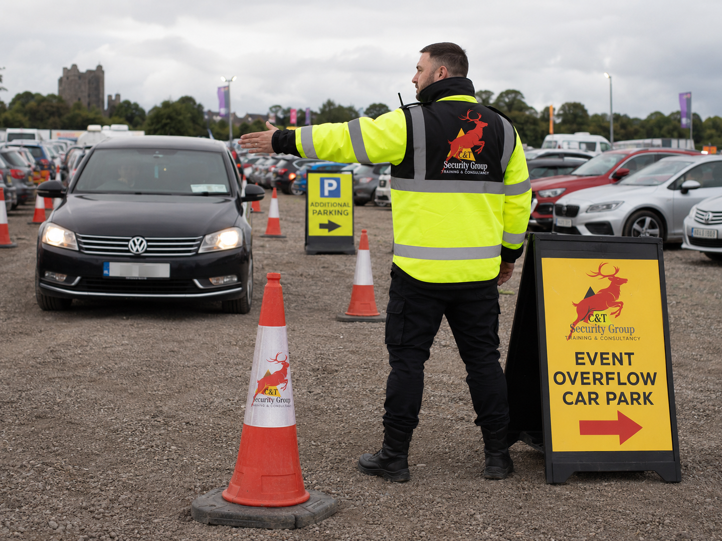 C&T Security Group officer directing vehicles into an event overflow car park