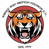 Ein Karate-Dojo-Logo mit einem Tigerkopf in einem Kreis.