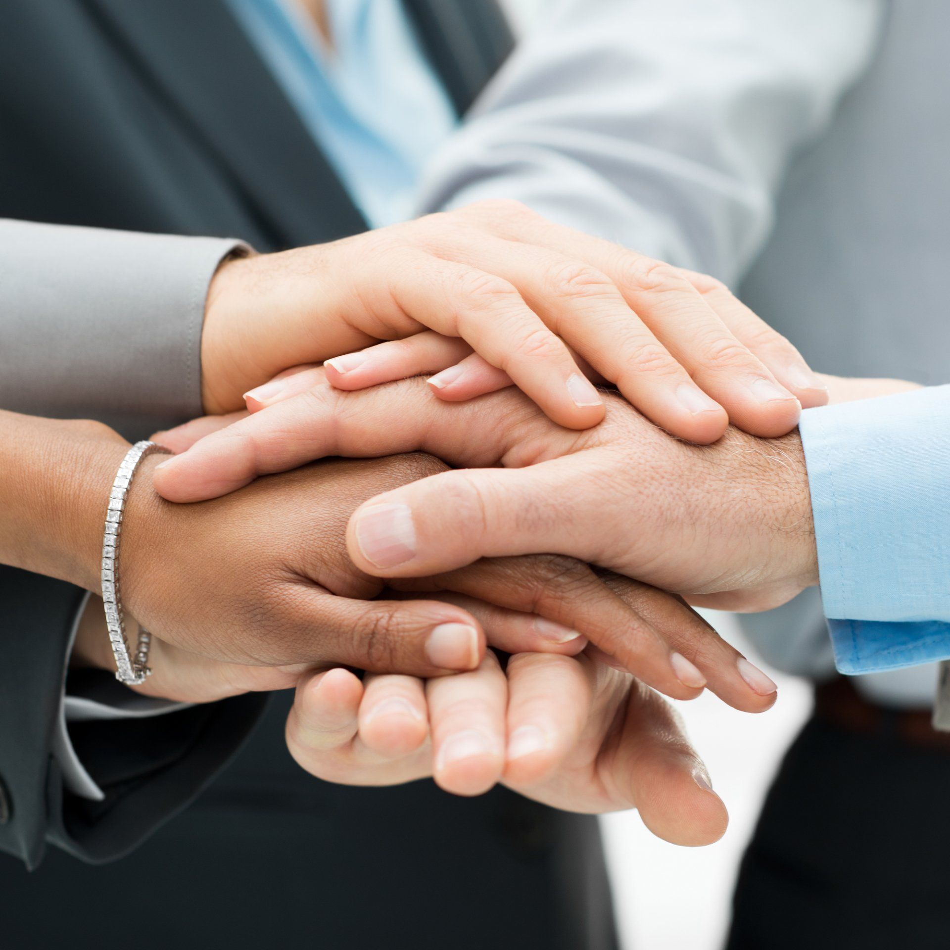 Stacked Hands — Russellville, AR — John W. Stottman Jr. CPA, PA.