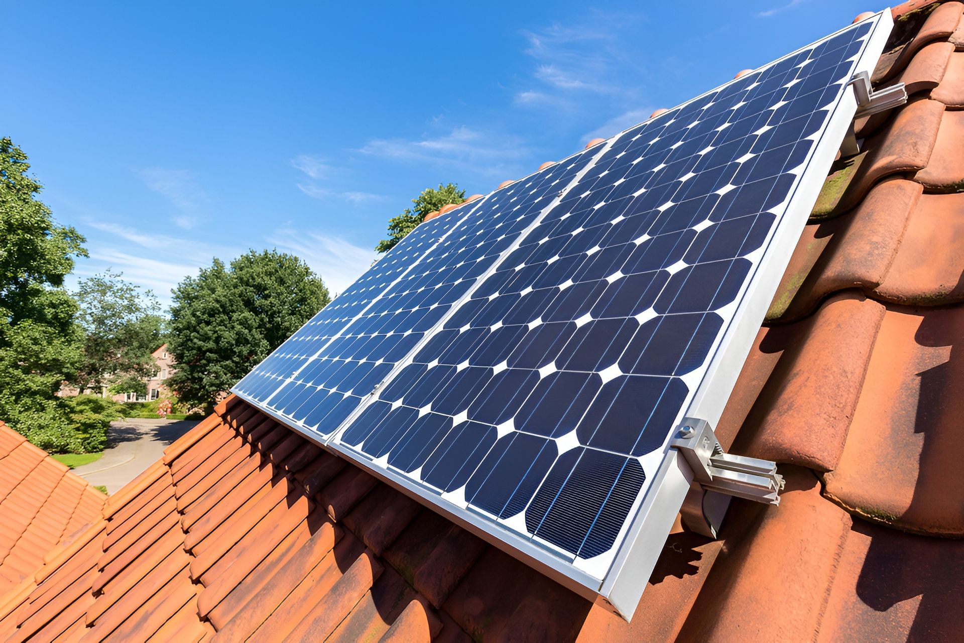 Solar Panels in a Field, Angled Toward a Sunset — Brian Williams Electrical Air Solar in Cooroibah, QLD