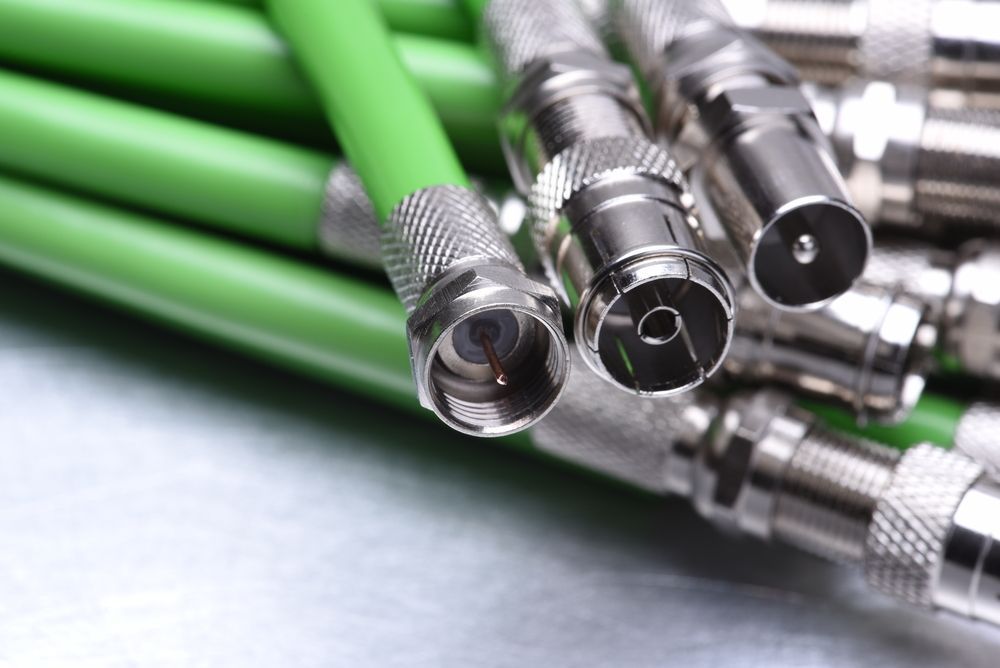 Green Coaxial Cables With Silver Connectors — Brian Williams Electrical Air Solar in Caloundra, QLD