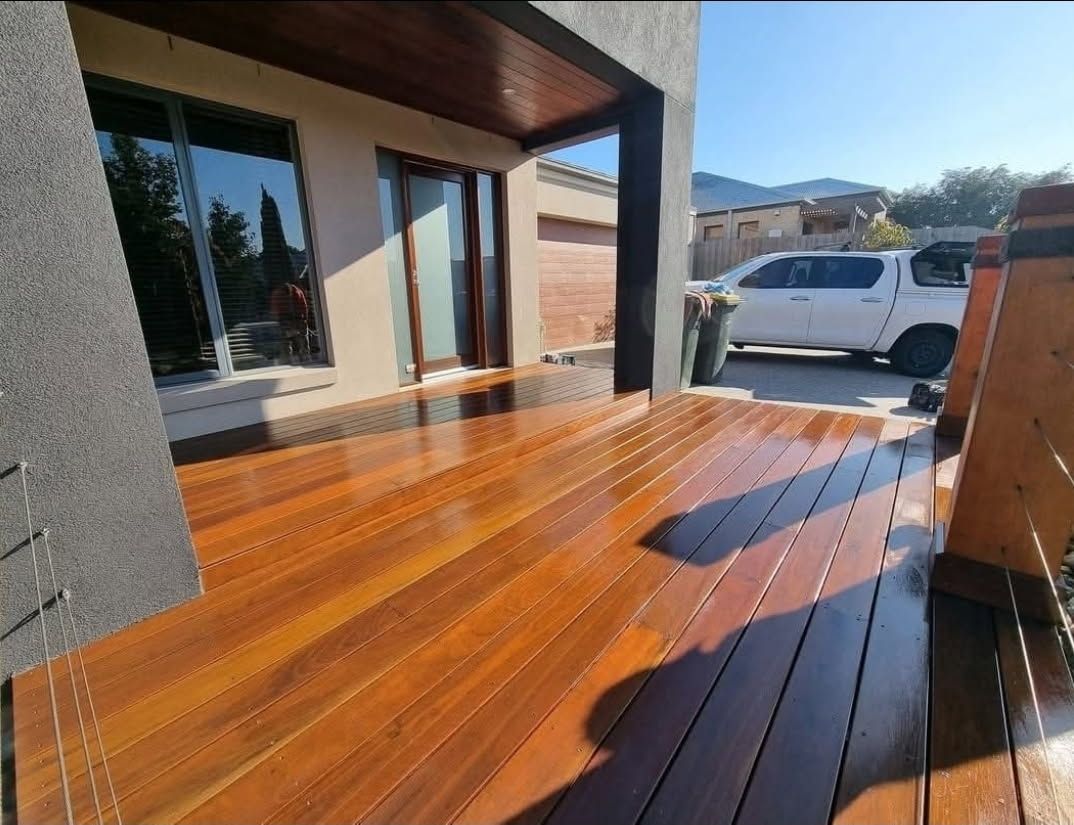 A White Truck is Parked on the Side of the Road in Front of a House — Painters Geelong in Geelong, VIC