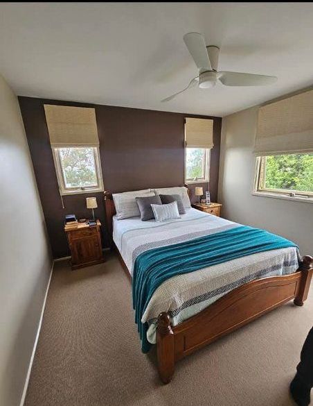 An Empty Walk in Closet with Shelves and a Light on the Ceiling — Painters Geelong in Geelong, VIC