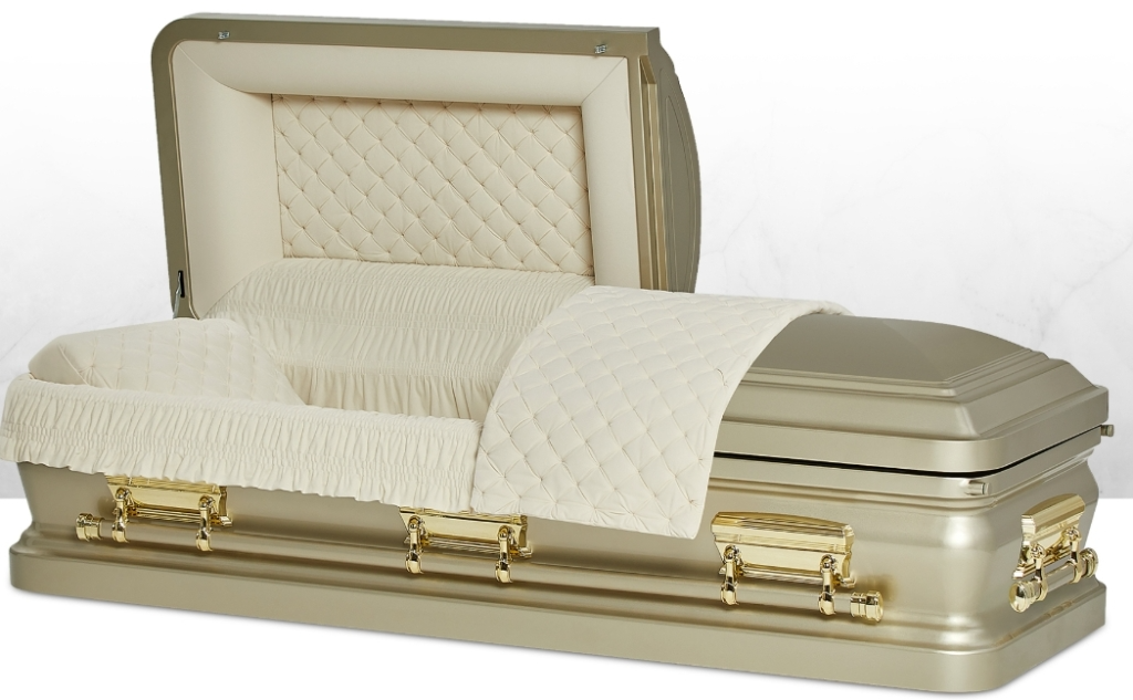Cream and gold quilted coffin with satin-lined interior and gold handles on a white background