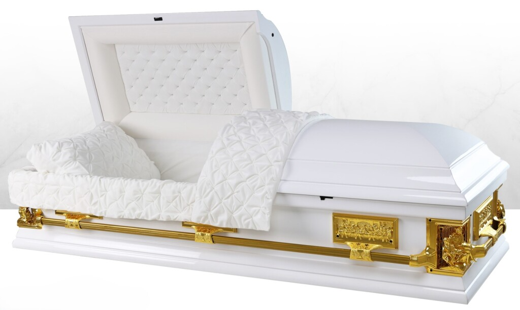White and gold open casket with quilted interior and pillows, shown on a plain white background