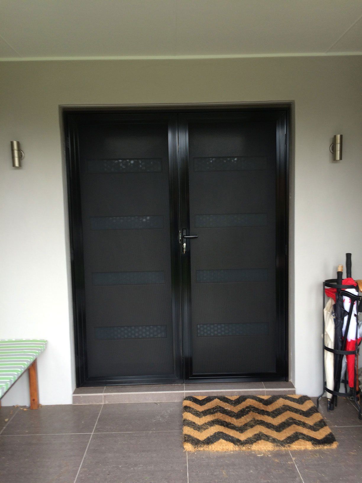 Closed Black Door With Screen — Clearshield Security Screens in Bomaderry, NSW