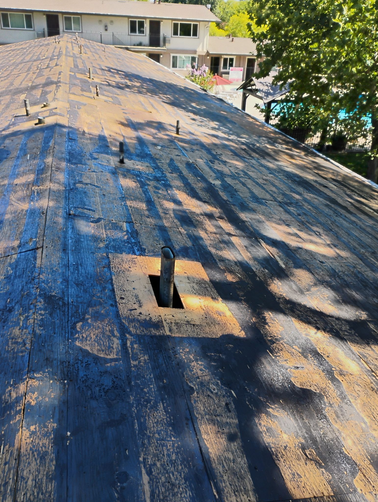 Carmichael Multi-Family Commercial Roof Tear-Off and Safe Debris Extraction