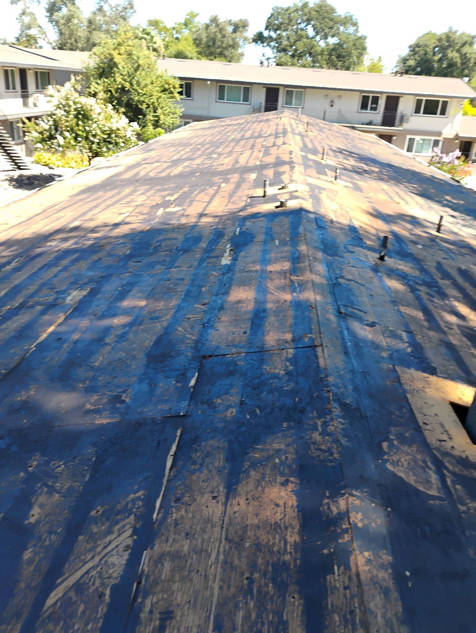 Carmichael Multi-Family Commercial Roof Tear-Off and Safe Debris Extraction