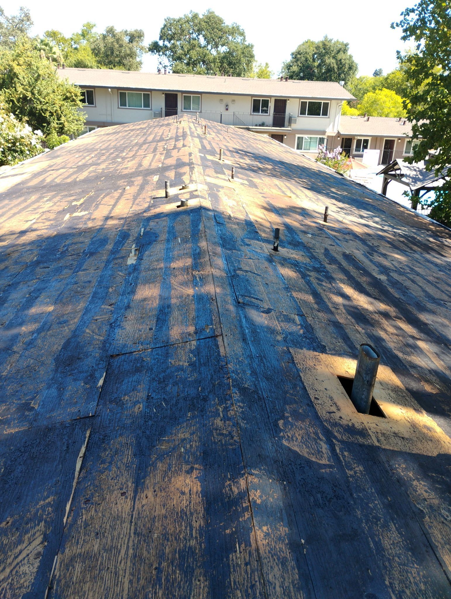 Carmichael Multi-Family Commercial Roof Tear-Off and Safe Debris Extraction