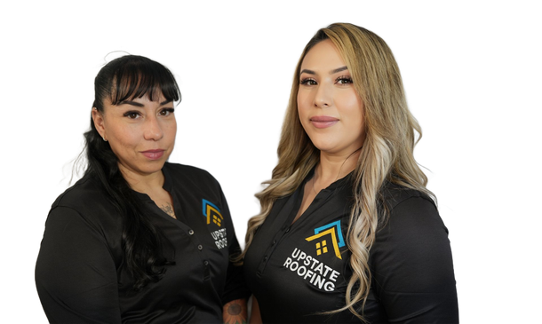 Two women in black branded tops posing against a white background
