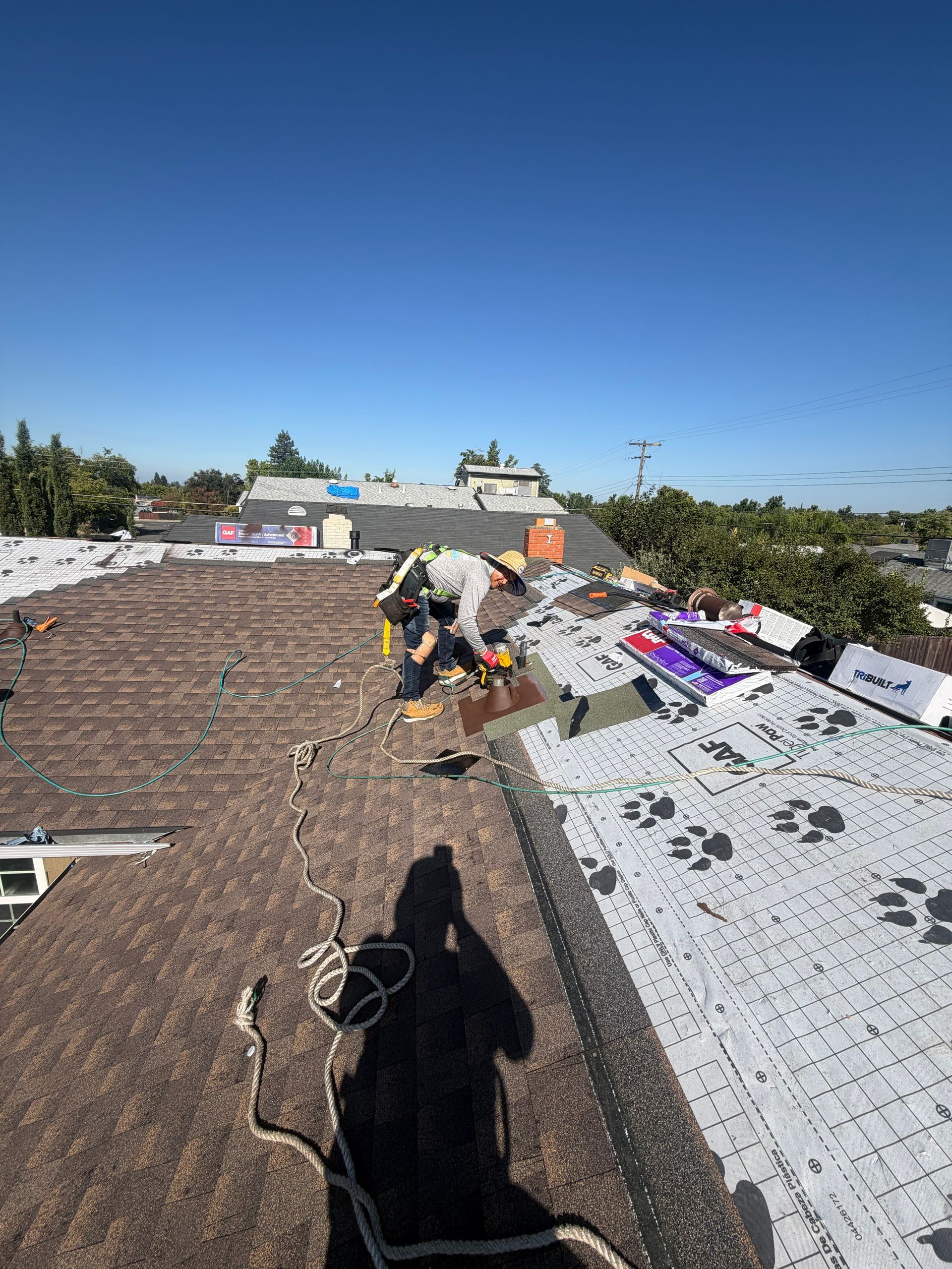 Carmichael Custom Residential Roof Replacement and Chimney Cricket Installation