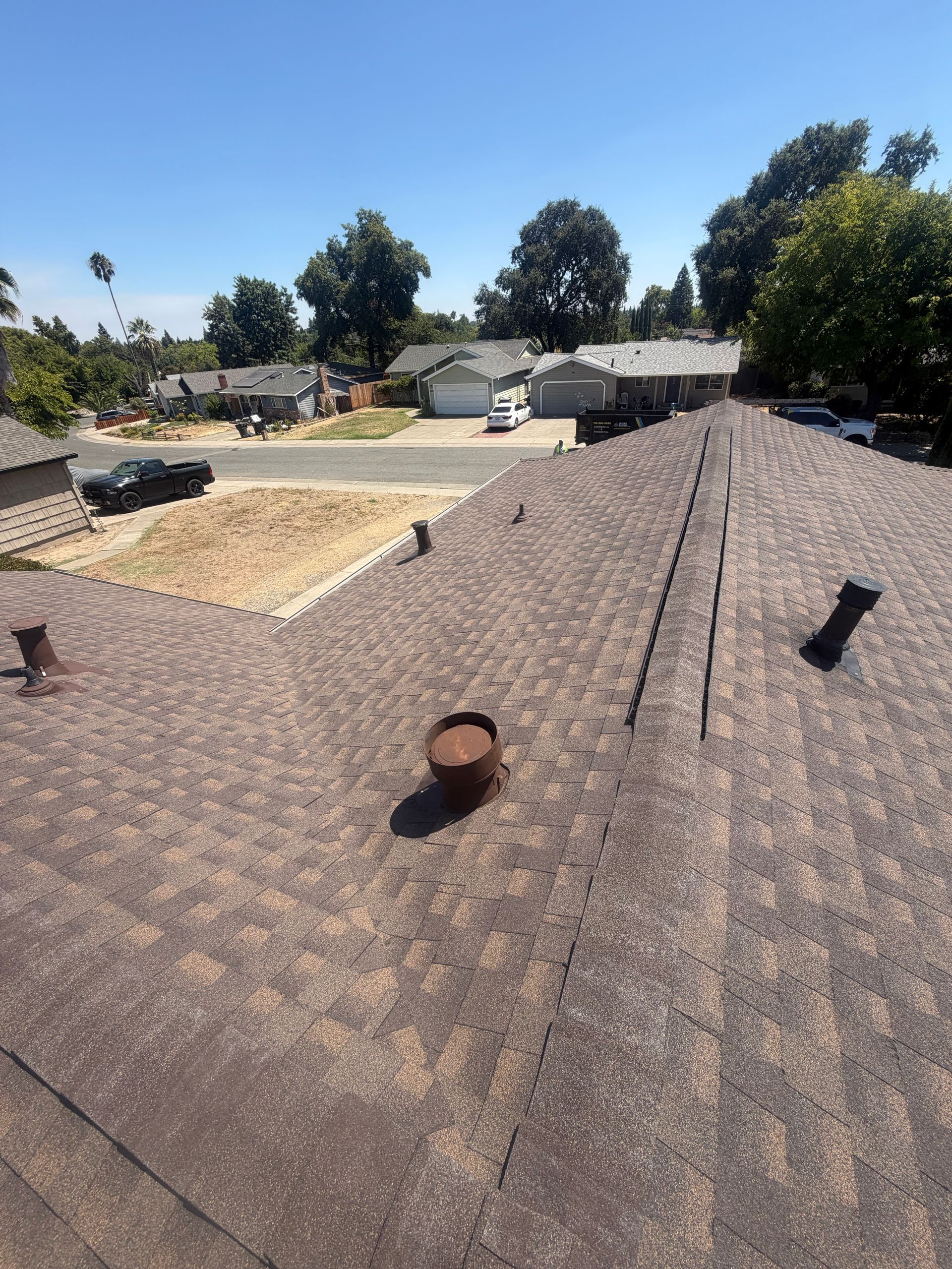Carmichael Custom Residential Roof Replacement and Chimney Cricket Installation