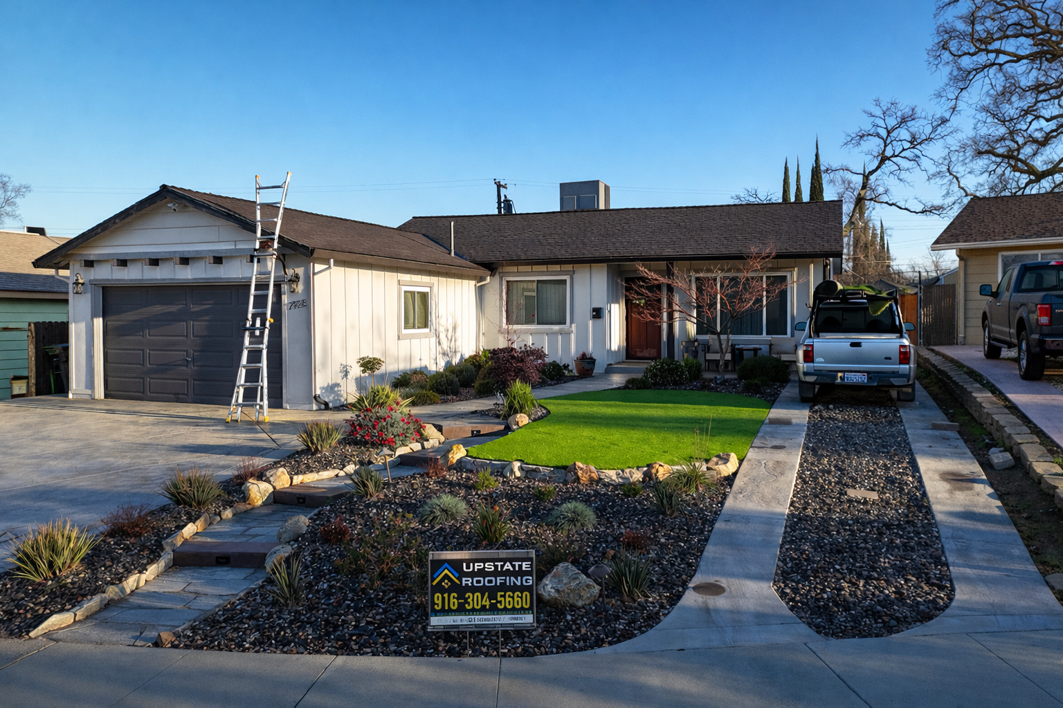 Suburban house with desert landscaping, a parked car, and a basketball hoop in the driveway.