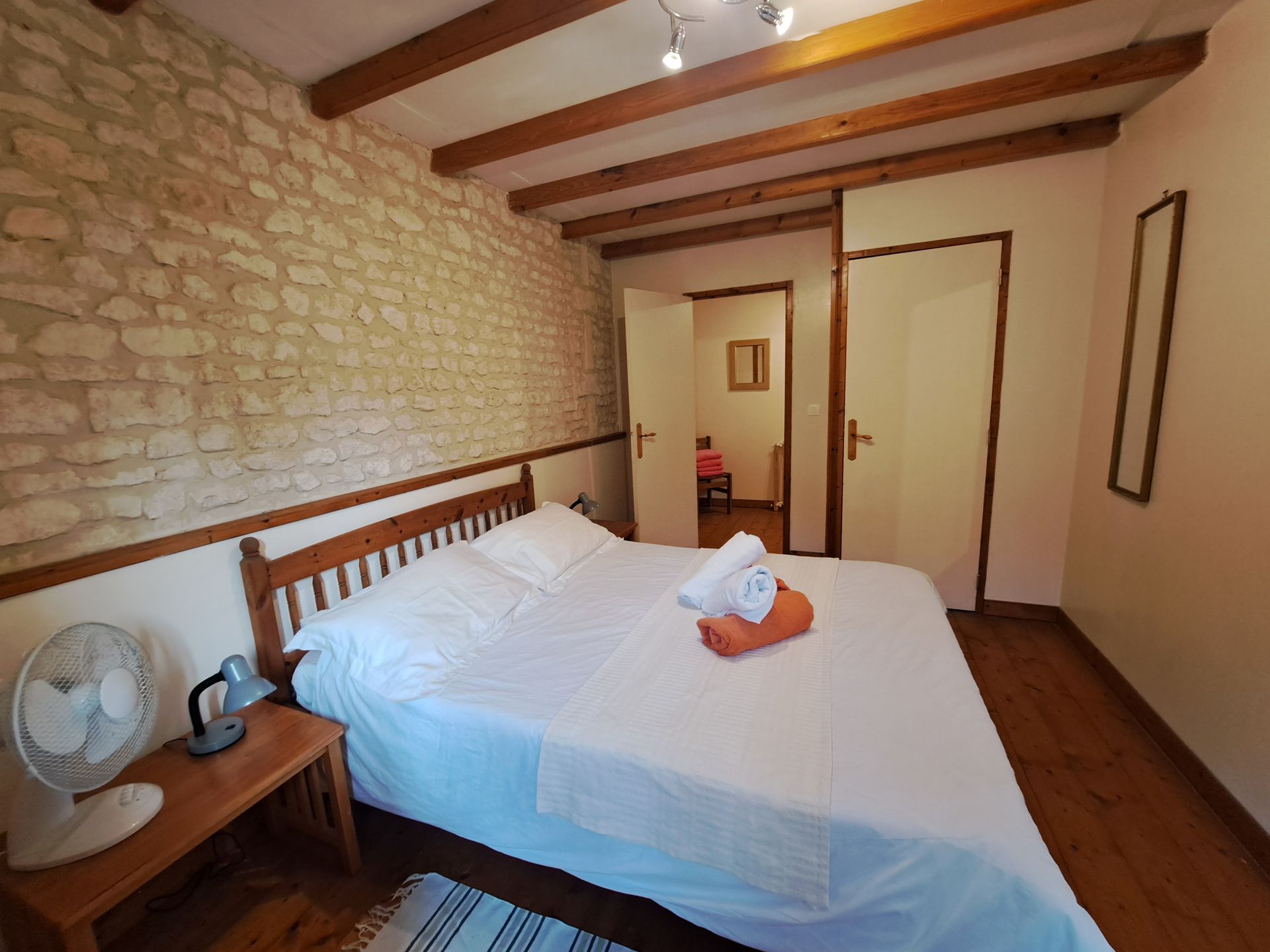 king sized bed with white bedding