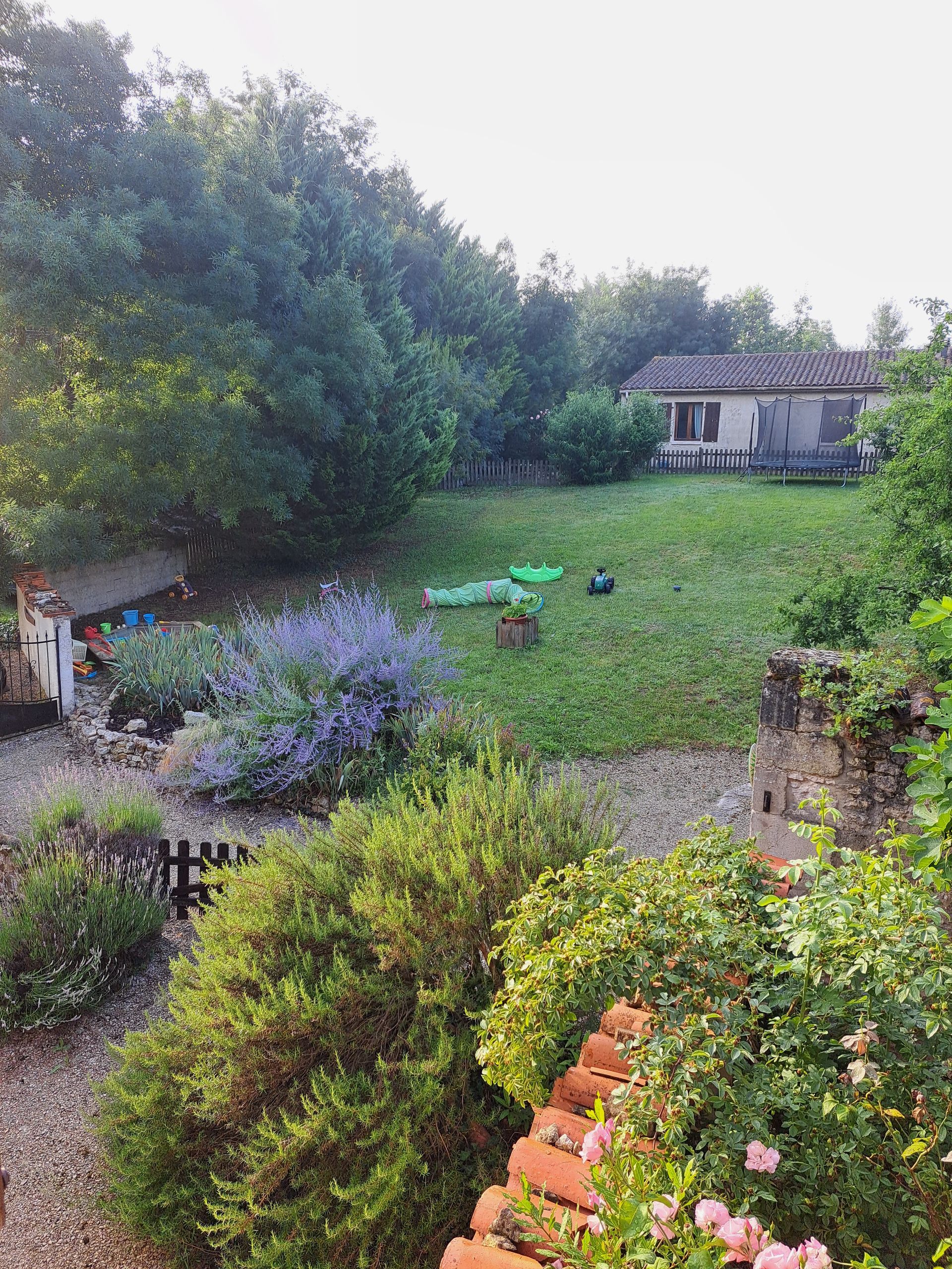view from second floor of French gite looking into play garden
