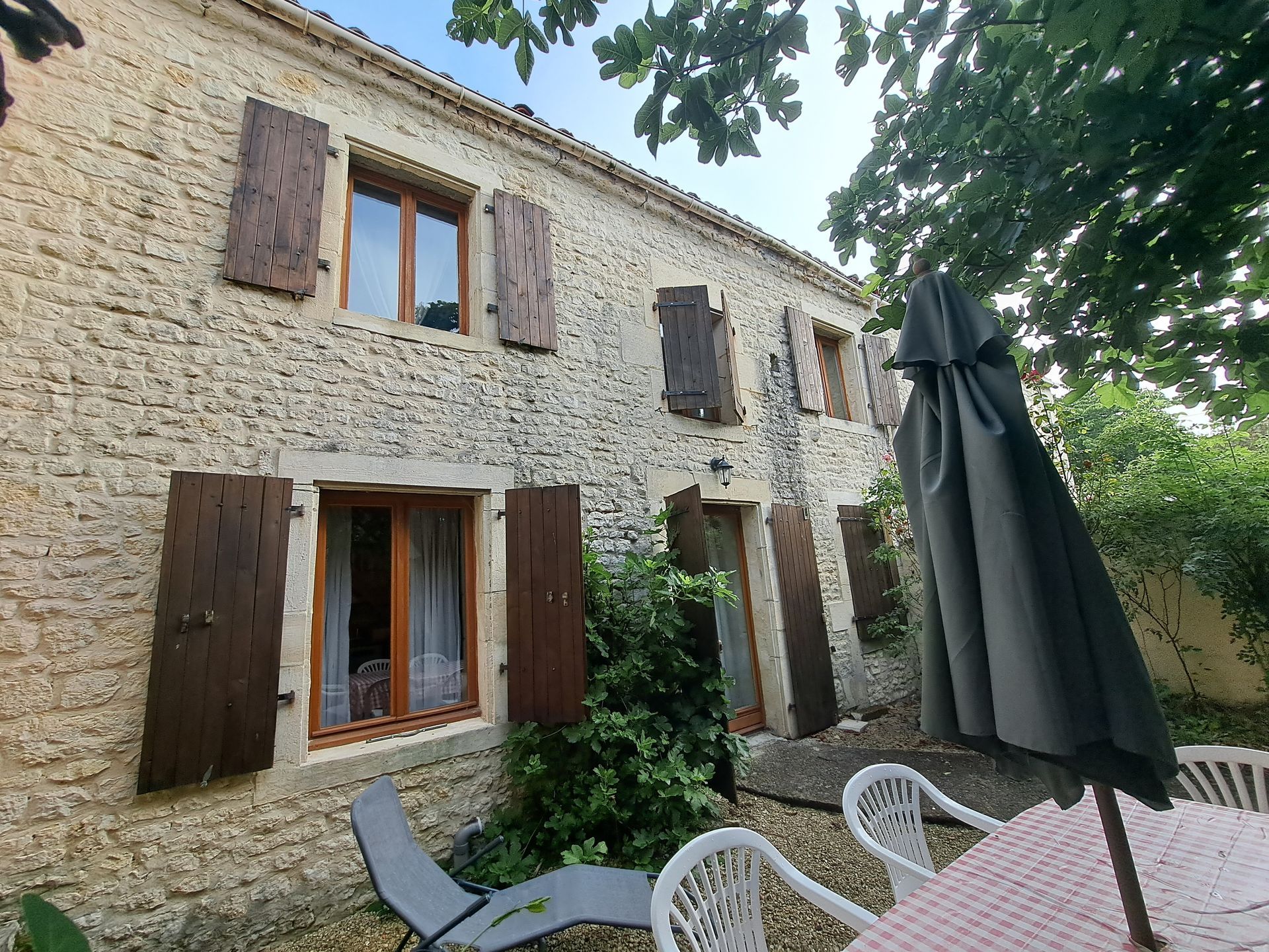 Front of a stone cottage in France