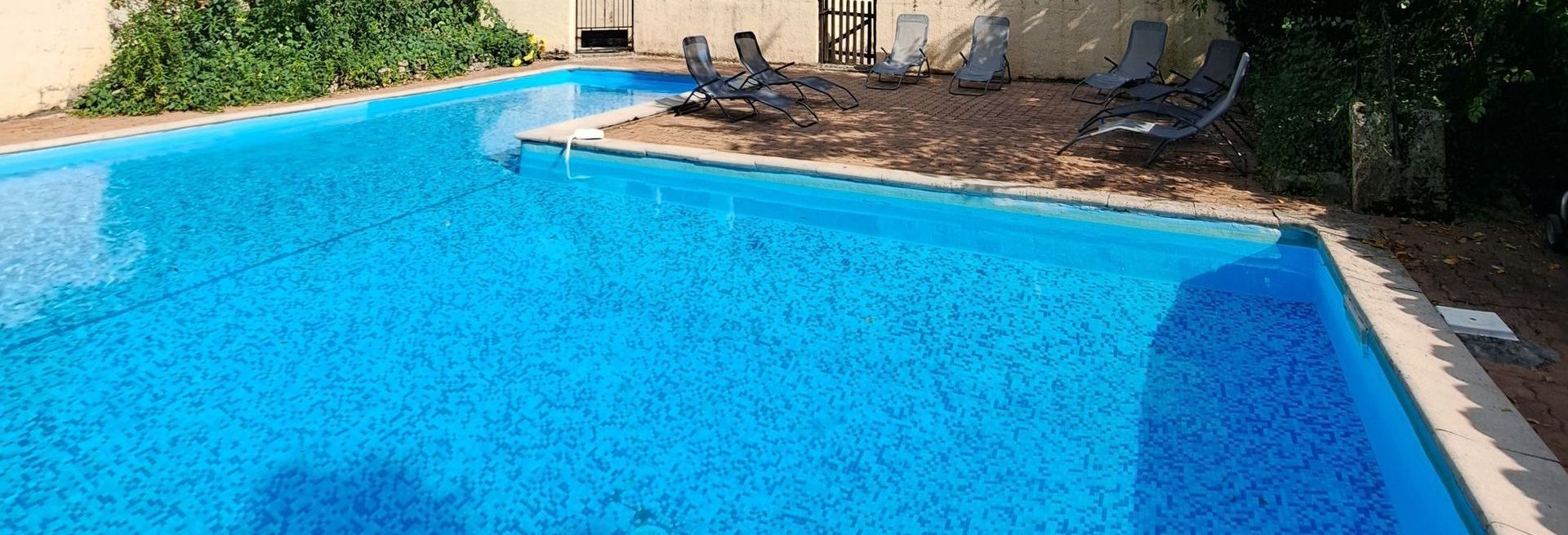 surface of a blue swimming pool