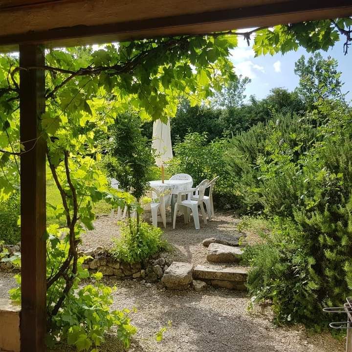 garden table, chairs and parasol