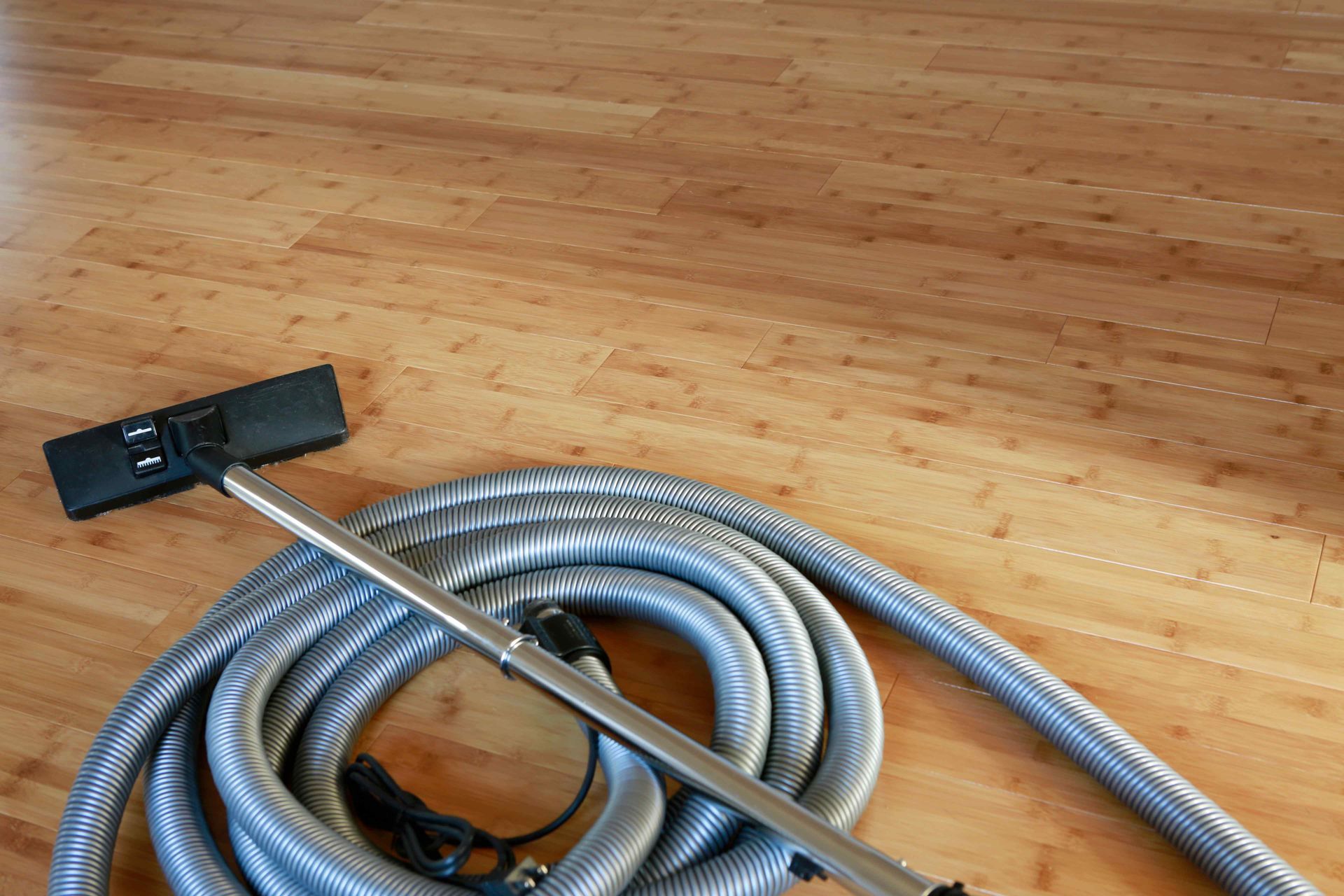 Floor cleaning equipment on a clean hardwood floor