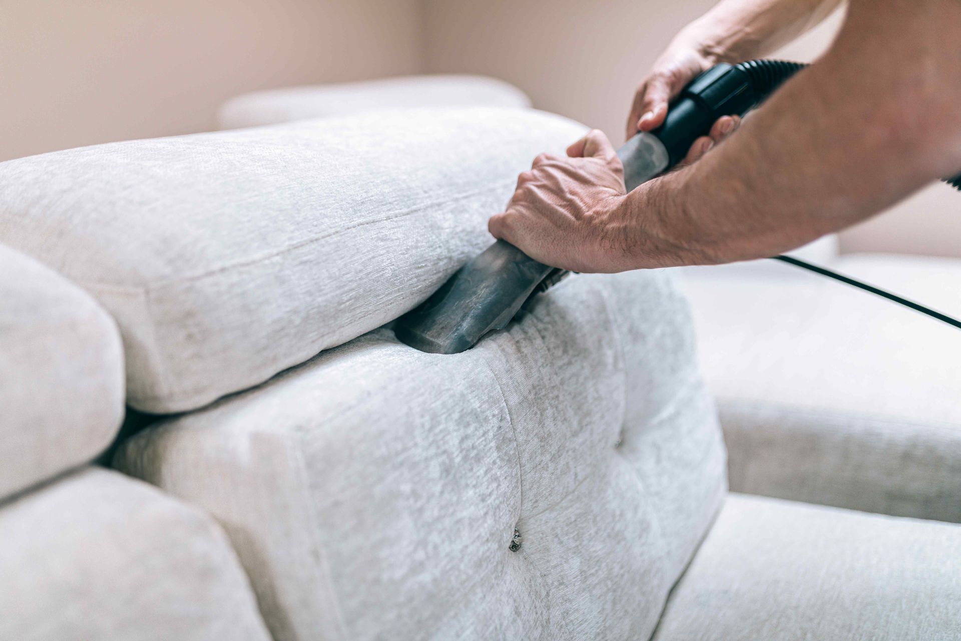 Cleaning all of the crevices on a sofa