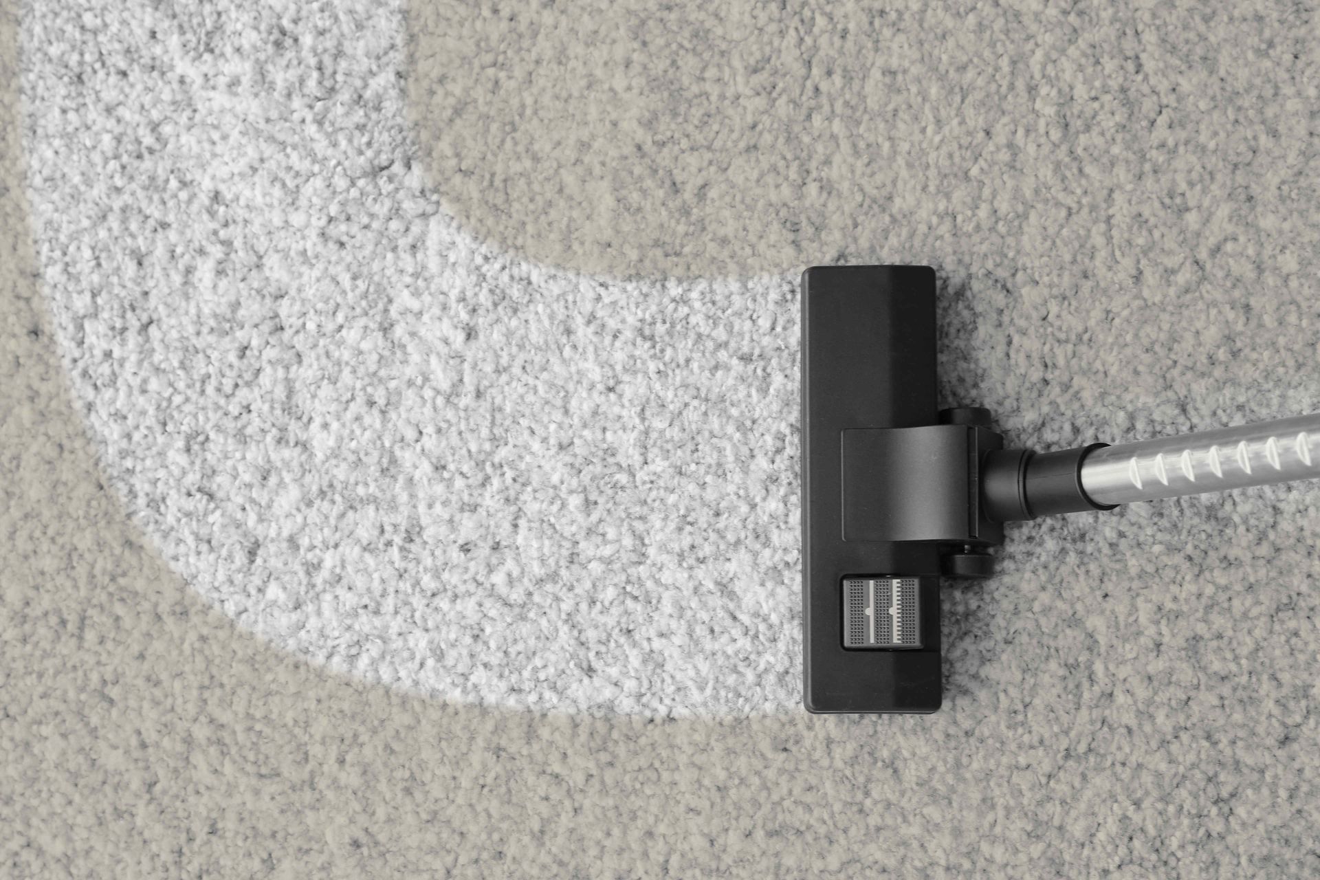 Comparison of dirty and clean spots on a carpet