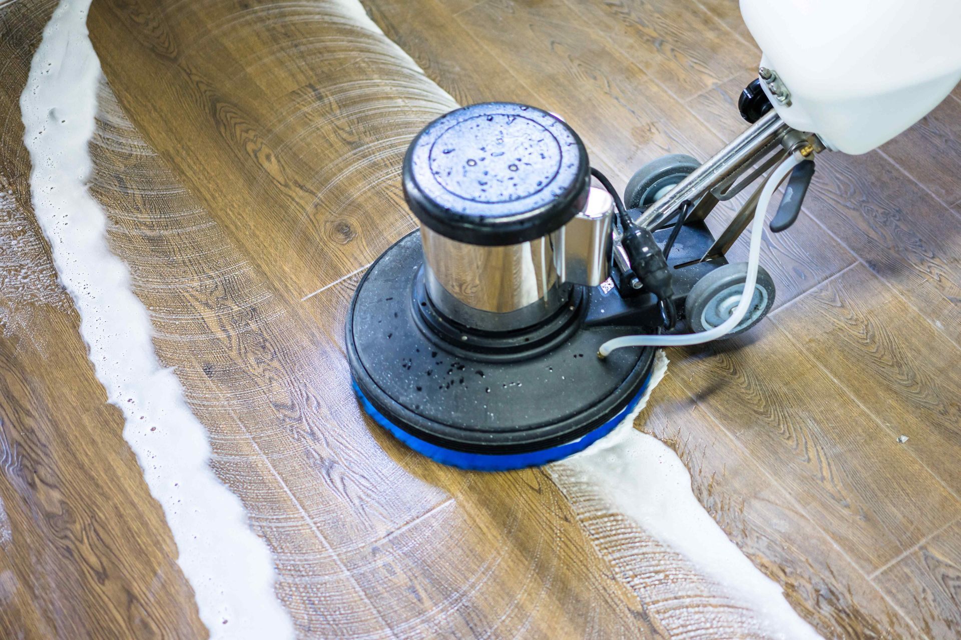 Scrubbing a hardwood floor