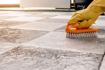 Scrubbing a tile floor