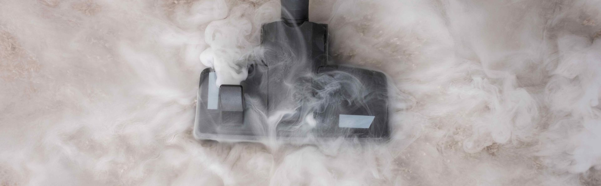 Steam cleaning a carpet