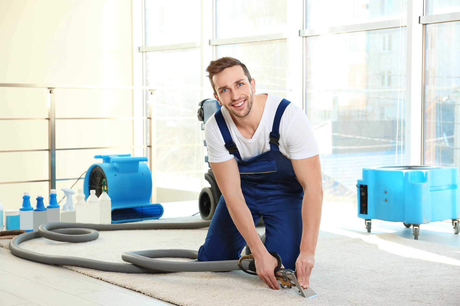 A happy carpet cleaning professional