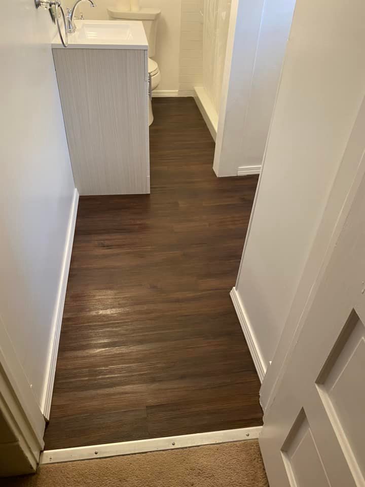 Hardwood floor installation in a hallway