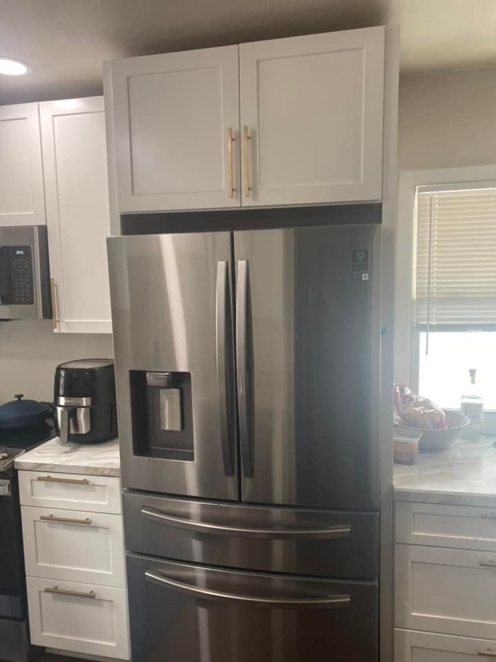 Kitchen cabinet installation above refrigerator