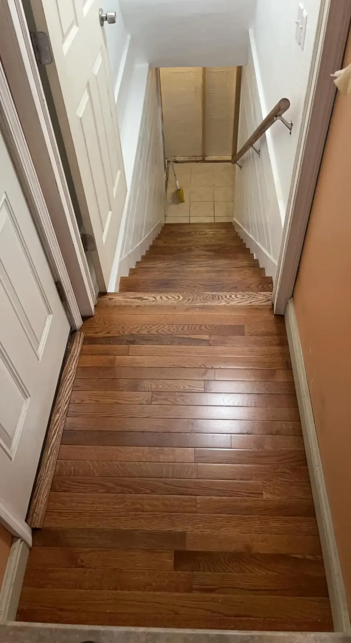 Staircase flooring repair and installation in a home