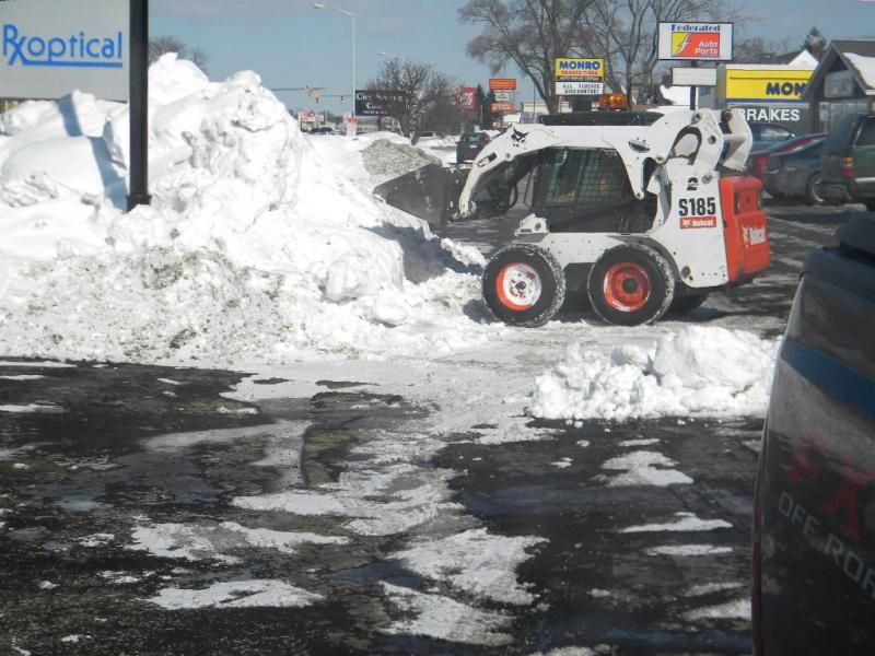 Snow Plowing Service Portage, MI Earth Works Lawn