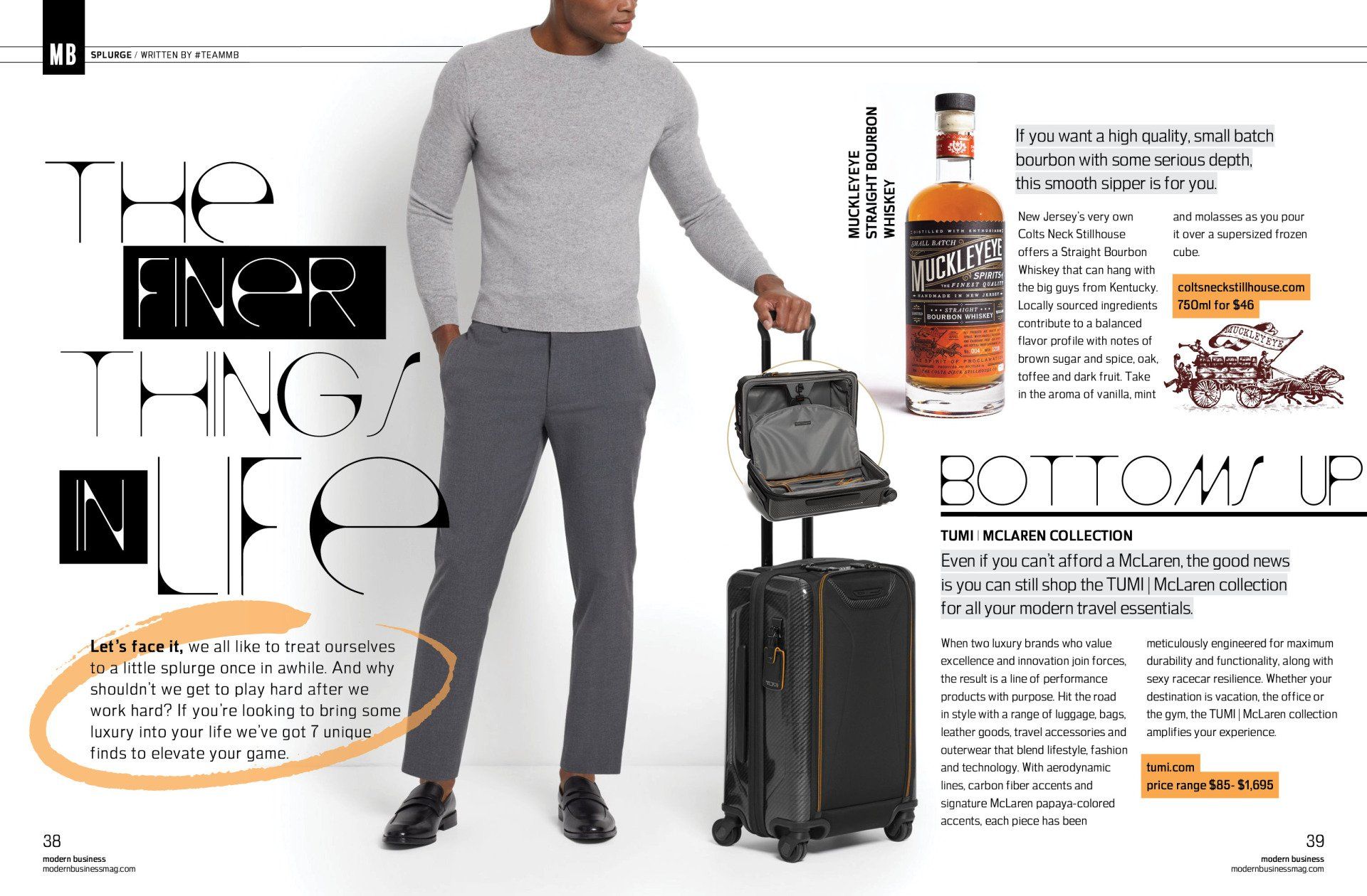 A man is standing next to a suitcase and a bottle of whiskey.