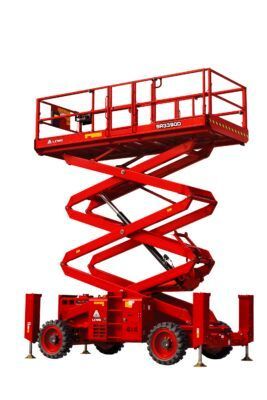 Red scissor electric lift raised high, red industrial work platform on wheels.