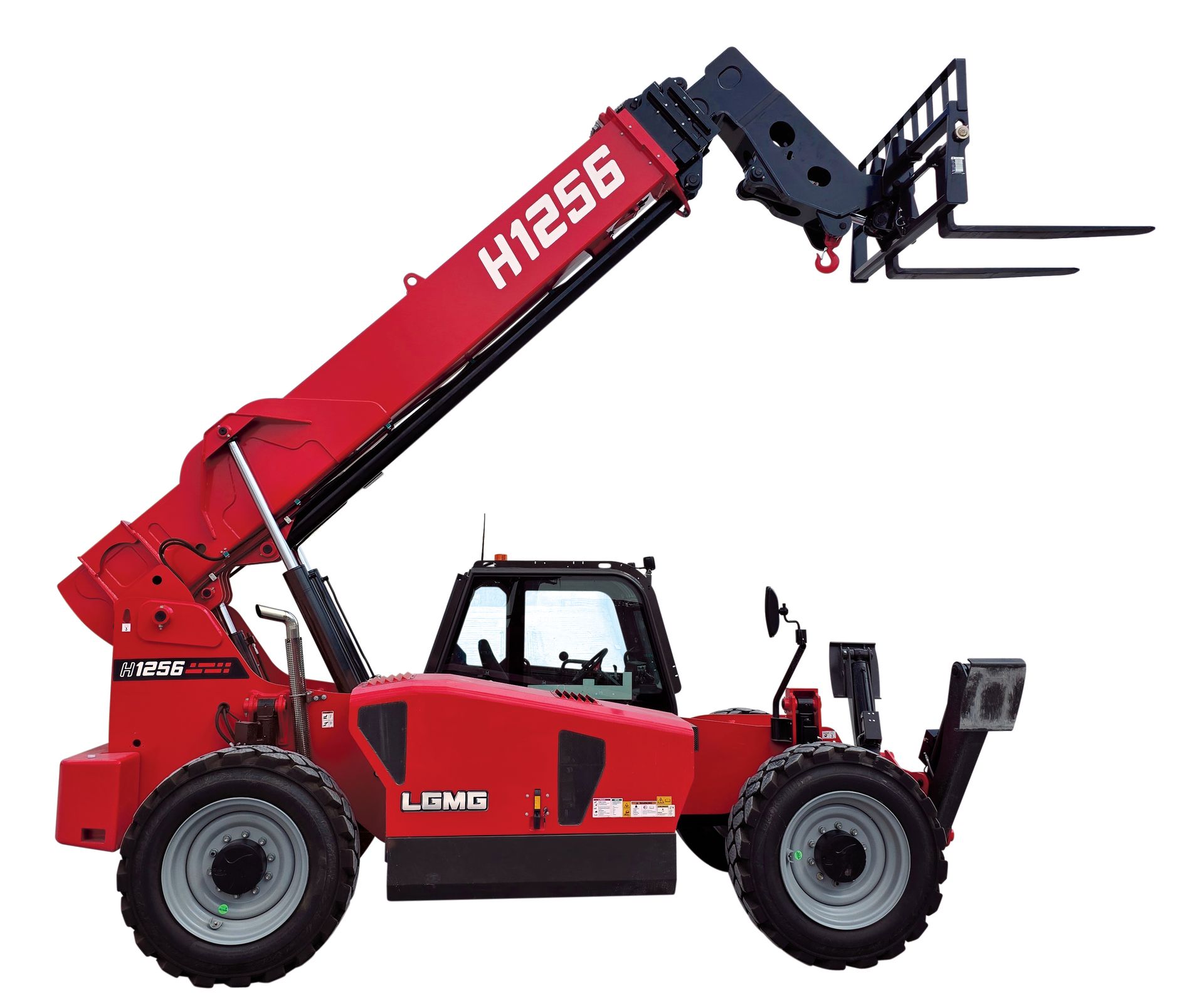 Red scissor electric lift raised high, red industrial work platform on wheels.