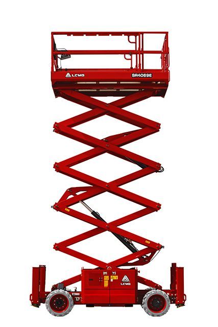 Red scissor electric lift raised high, red industrial work platform on wheels.