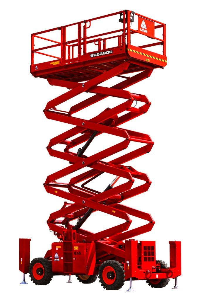 Red diesel rough terrain scissor lift platform raised high, painted bright red on a white background