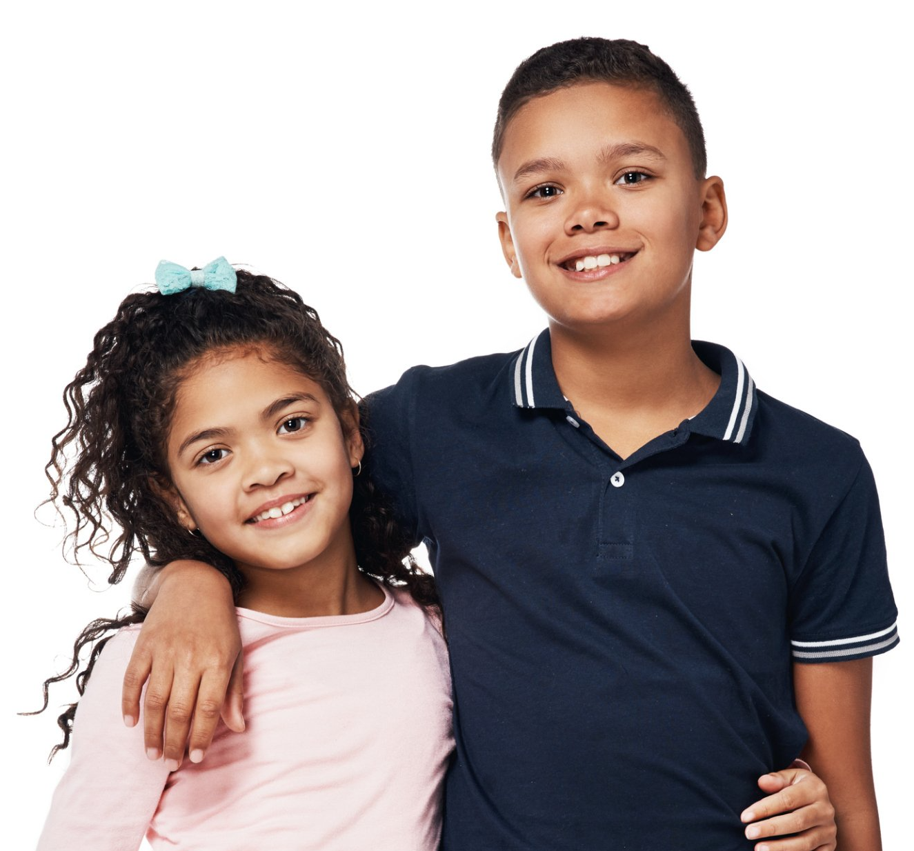 A boy and a girl are posing for a picture together