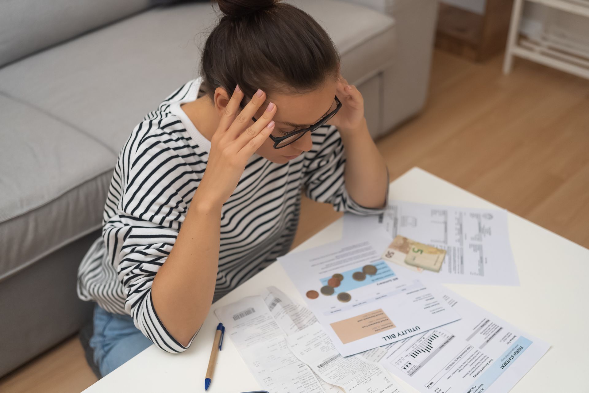 sad woman getting her debt in order 