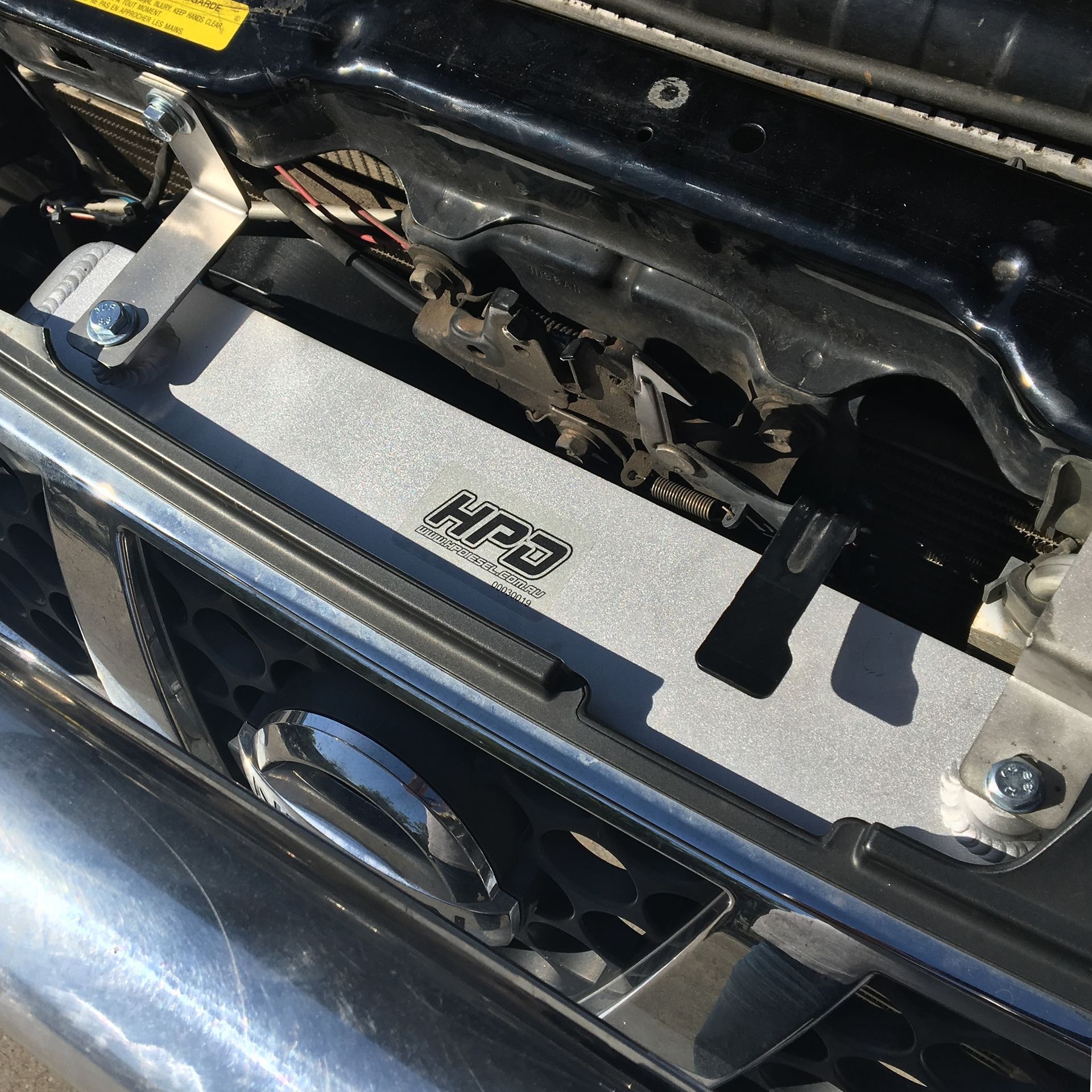 A Close Up of the Underside of a Car With the Word Hpd on It — Practic Automotive Services In Thirroul, NSW