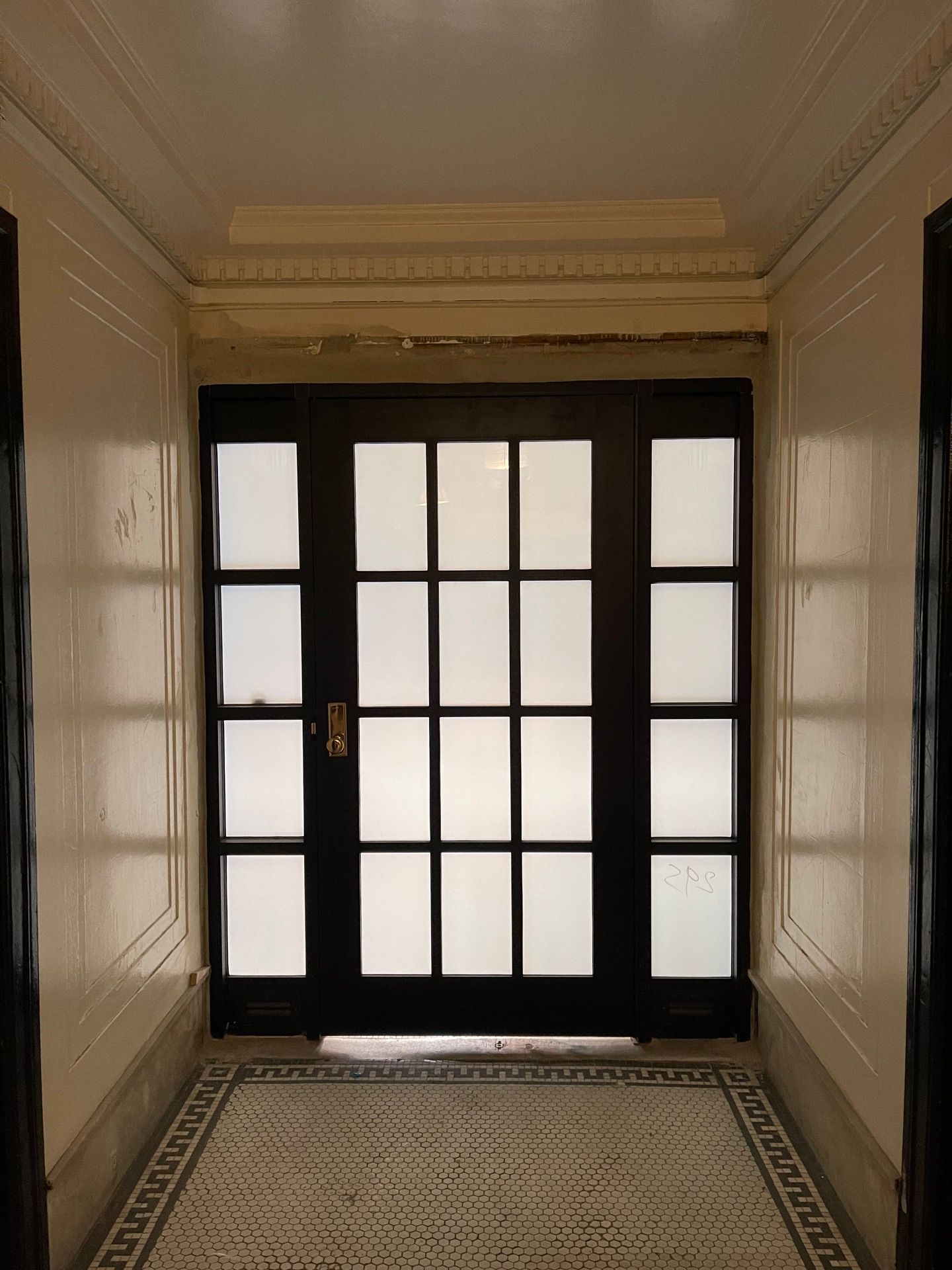 Installed vestibule door at an apartment building in Long Island City, Queens