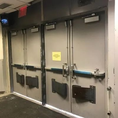Fire-Rated Door installation with panic bars at building in NYC