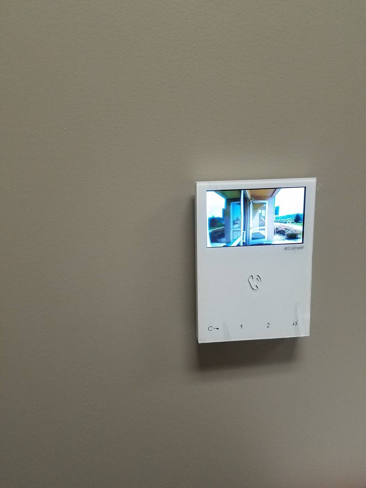 Hands-free color video intercom monitor showing the church entrance in a West Orange, NJ office