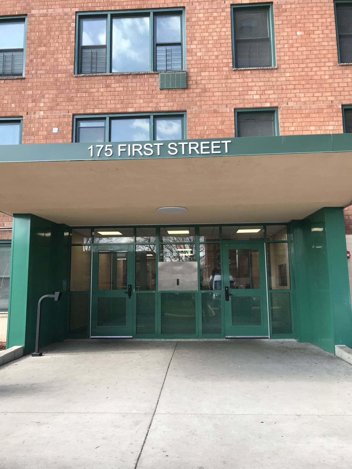Completed aluminum storefront entrance at 175 First Street, Garden Spires, Newark NJ, installed by Parker Custom Security