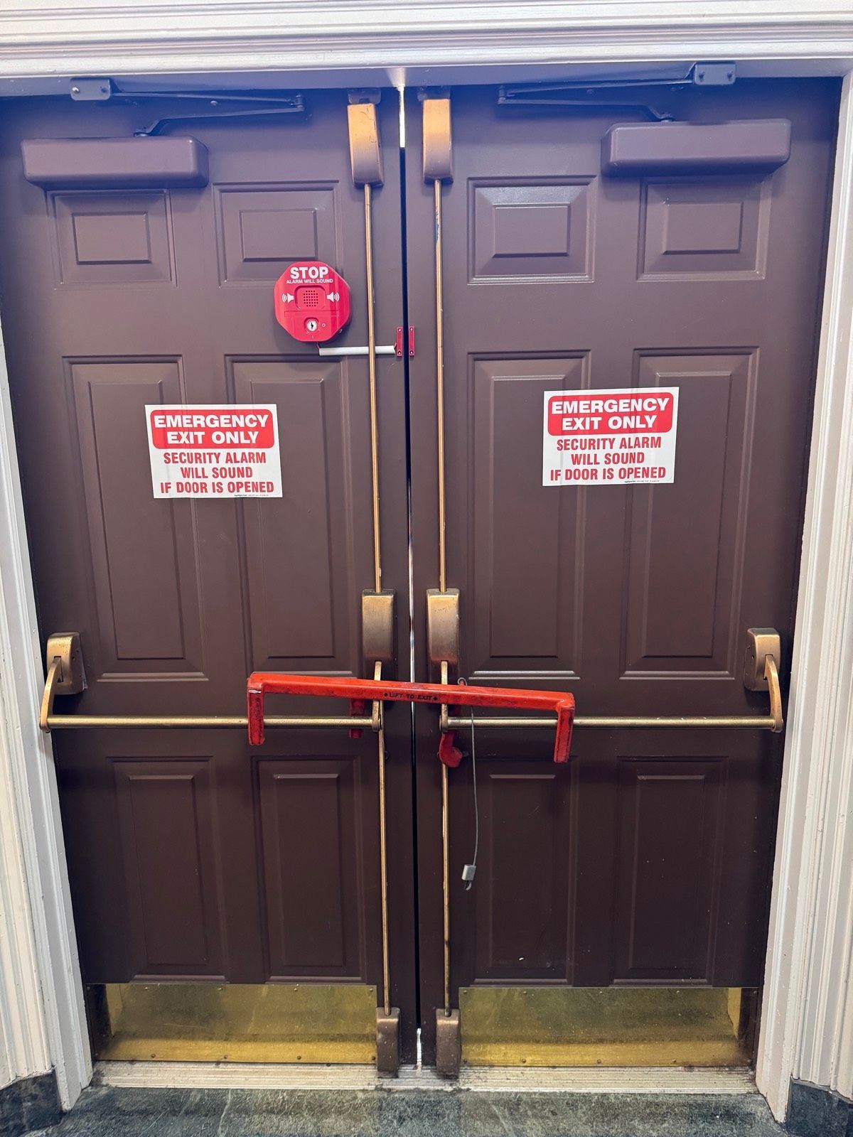 Detex alarmed exit device mounted on an interior door at St. Clare's Church in Staten Island, NY