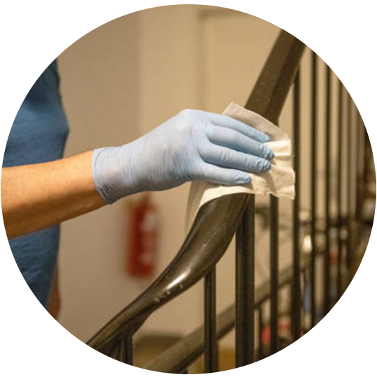 Man Wiping Down The Fence — Brisbane, QLD — Black & White Home Services